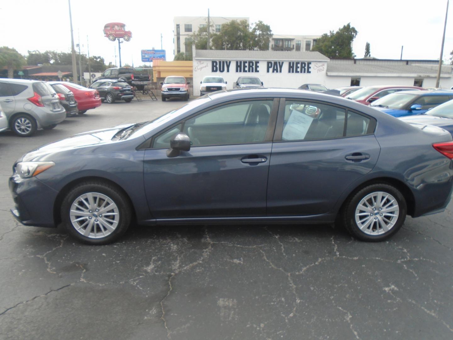 2017 Subaru Impreza 2.0i Premium CVT 4-Door (4S3GKAB65H3) with an 2.0L H4 DOHC 16V engine, CVT transmission, located at 6112 N Florida Avenue, Tampa, FL, 33604, (888) 521-5131, 27.954929, -82.459534 - Photo#0